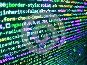 Programmer occupation job. Hacker background. Developer working on program codes in office. Data encryption security code on a