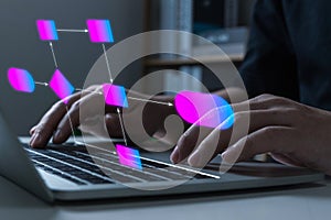 IT programmer people hand working on laptop computer with digital flowchart database diagram