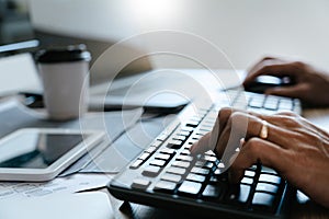 Programmer Typing Code on desktop computer, Developing programming and coding technologies concept
