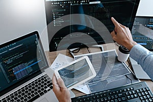 Programmer Typing Code on desktop computer, Developing programming and coding technologies concept