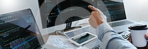 Programmer Typing Code on desktop computer, Developing programming and coding technologies concept