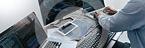 Programmer Typing Code on desktop computer, Developing programming and coding technologies concept