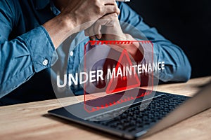 Programmer Update software system with under maintenance system.