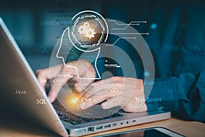 Programmer using laptop with AI head and coding language icons. Concept of automated coding, software development, artificial