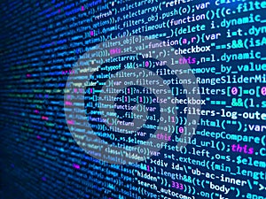 Programmer working on computer screen. Developer working on program codes. Vignette light and dark shadow dramatic effect.