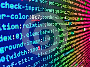 Programmer working in computer screen. Lines of code of a software with several colors. Search engine optimization for better