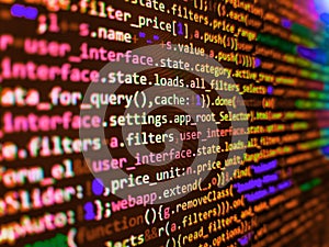 Programmer working on computer screen. Computer program preview. Programming code abstract background screen of software. Python