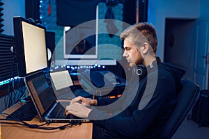 Programmer working on laptop, computer technology