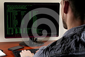 Programmer working on the laptop