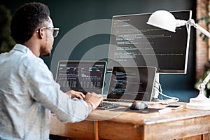 Programmer working with program code