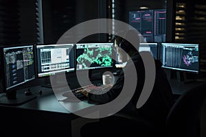 Programmer working at their computer, surrounded by monitors displaying code. Generative AI