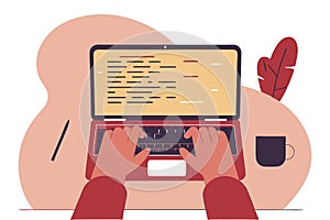 Programmer writes code on a laptop. Software development