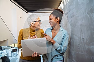 Programmers cooperating at IT company developing apps. People business work office concept