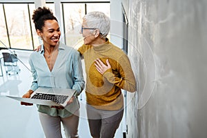 Programmers cooperating at IT company developing apps. People business work office concept