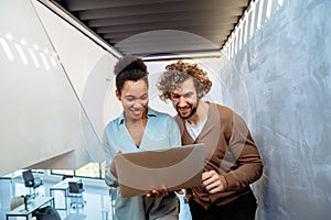 Programmers cooperating at IT company developing apps. People business work office concept