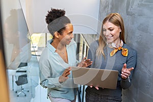 Programmers cooperating at IT company developing apps. People business work office concept