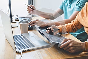 Programmers cooperating at Developing programming and website working in a software develop company office, writing codes and