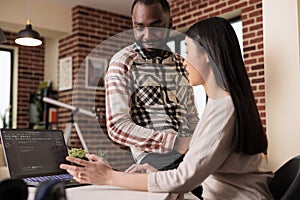 Programmers couple developing encryption code