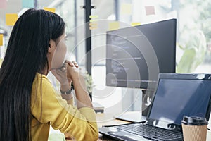 Programmers and developer teams are coding and developing software.