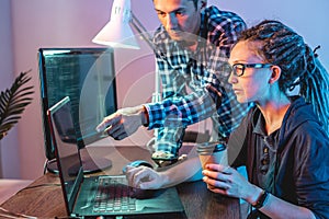 Programmers are developing software by working with software code together. Team work