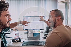 Programmers engrossed in deep collaboration, diligently working together to solve complex problems and develop