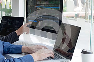Programmers work on the development of coding and coding technology on white desks and website design, software, data processing