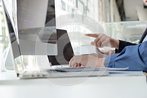 Programmers work on the development of coding and coding technology on white desks and website design, software, data processing