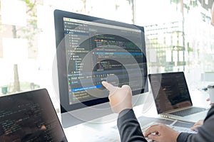 Programmers work on the development of coding and coding technology on white desks and website design, software, data processing