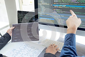 Programmers work on the development of coding and coding technology on white desks and website design, software, data processing