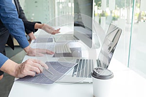 Programmers work on the development of coding and coding technology on white desks and website design, software, data processing