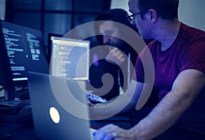 Programmers working on computer program