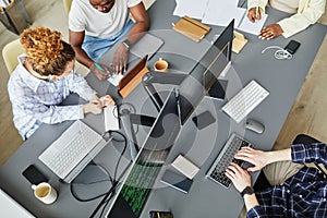 Programmers working in team at IT company