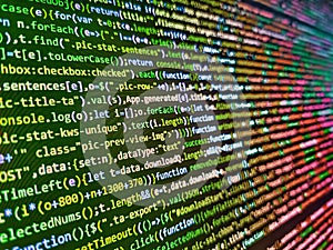 Programming abstract - source code and binary code on display of software developer. Programming preventing hacks in Internet