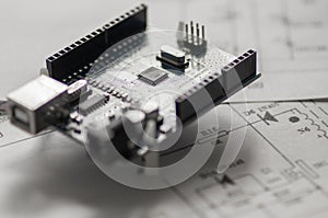 Programming board of Arduino UNO in blue colour isolated in white background