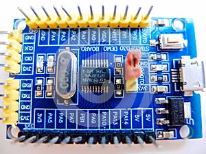 Programming board of Arduino UNO in blue colour isolated in white background
