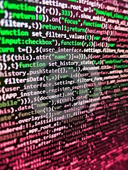Programming code abstract background screen of software. Developer software programming code. Lines of Html code visible.