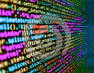 Programming code abstract background screen of software. Matrix byte of binary data rian code running abstract background in dark