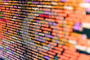 Programming code abstract screen of software developer. Closeup of Web Code on Computer LED Screen. Hi-tech modern screen of data