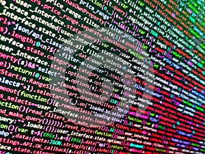 Programming code abstract screen of software developer. Shallow depth of field, selective focus effect. Lots of digits on the