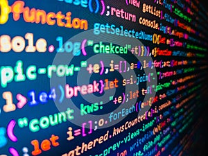 Programming code abstract technology. Developer working on program codes in office. Programming abstract - source code and binary