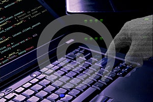 Programming Code and Digital Hand Representing Cyber Attack and Data Breach