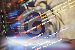 Programming code on the laptop screen. Notebook closeup.