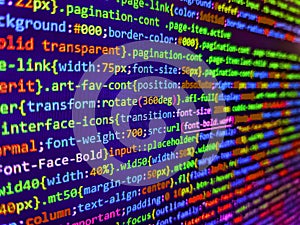 Programming code screen of software developer. Programmer Typing New Lines of HTML Code. Php code on blue background in code