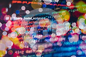 Programming code typing. Source code close-up. Programmer working on computer screen. Real software development code. Cyber space