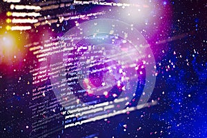 Programming code typing. Source code close-up. Programmer working on computer screen. Real software development code. Cyber space