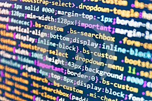 Programming of Internet website. Writing programming functions on laptop.