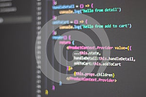 Programming language on black screen background, Javascript React code