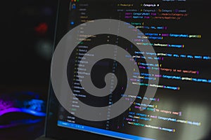 Programming language on black screen background, Javascript React code