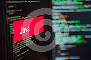 Programming language, Java inscription on the background of computer code.