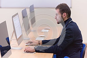 Programming. Man Working On Computer In IT Office, Sitting At Desk Writing Codes. Programmer Typing Data Code, Working On Project